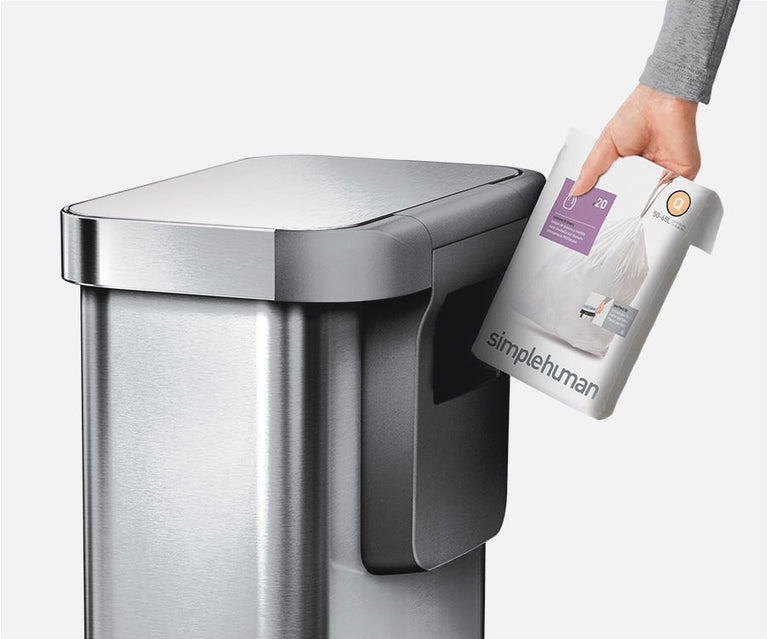 Simplehuman's custom fit liners fit perfectly in the built-in liner pocket. 