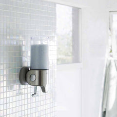 single wall mount pump - lifestyle in shower