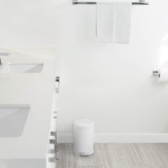 4.5L round pedal bin - white finish - lifestyle in bathroom near sink