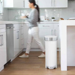 45L slim pedal bin - white steel - lifestyle woman in background in kitchen