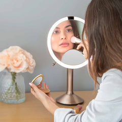 sensor mirror trio - rose gold finish - lifestyle woman applying makeup