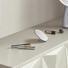 sensor mirror compact 10x - brushed finish - lifestyle mirror on vanity image